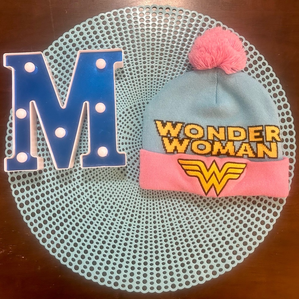 Wonder Woman Pom-Pom Beanie - Pink and Blue, one size fits most.
